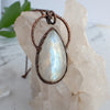 Beautiful flashes of light play in this Rainbow Moonstone and Copper handmade necklace.