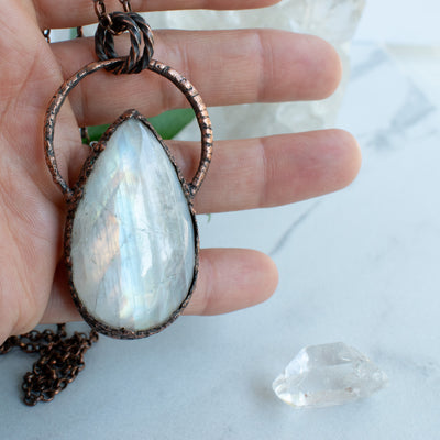 Beautiful flashes of light play in this Rainbow Moonstone and Copper handmade necklace.