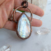 Beautiful flashes of light play on the backside of this stunning Rainbow Moonstone and Copper handmade necklace.