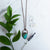 A wonderfully soothing and calming Blue Opal and Copper necklace shown beside green leaves and a purple lavender sprig.