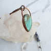 Side view showing the copper details on this Blue Opal pendant.