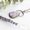 Side angle showing the detailing on the copper electroformed and Lepidolite healing necklace.