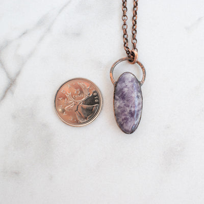 Lepidolite and Copper necklace shown beside Canadian Quarter coin.