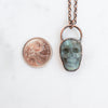 Labradorite and Copper electroformed pendant shown beside a Canadian Quarter coin.