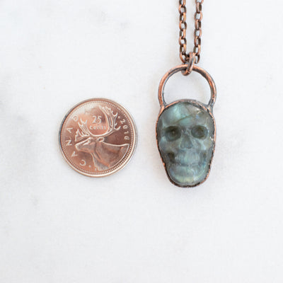 Labradorite and Copper electroformed pendant shown beside a Canadian Quarter coin.