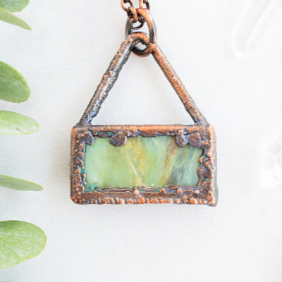 Back view of this Blue Peruvian Opal and Copper pendant show the textured detail.