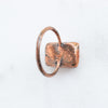 Back view of a Peach Moonstone and Copper ring shows the detail and patina on the pure copper.