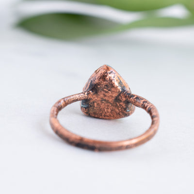 Back side of the Blue Apatite and Copper ring, showing the texture and patina of the metal.