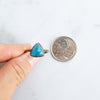 Blue Apatite and Copper ring beside a Canadian Quarter coin.