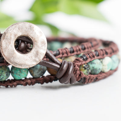 Close up photo shows the details on this African Turquoise and leather wrap bracelet.